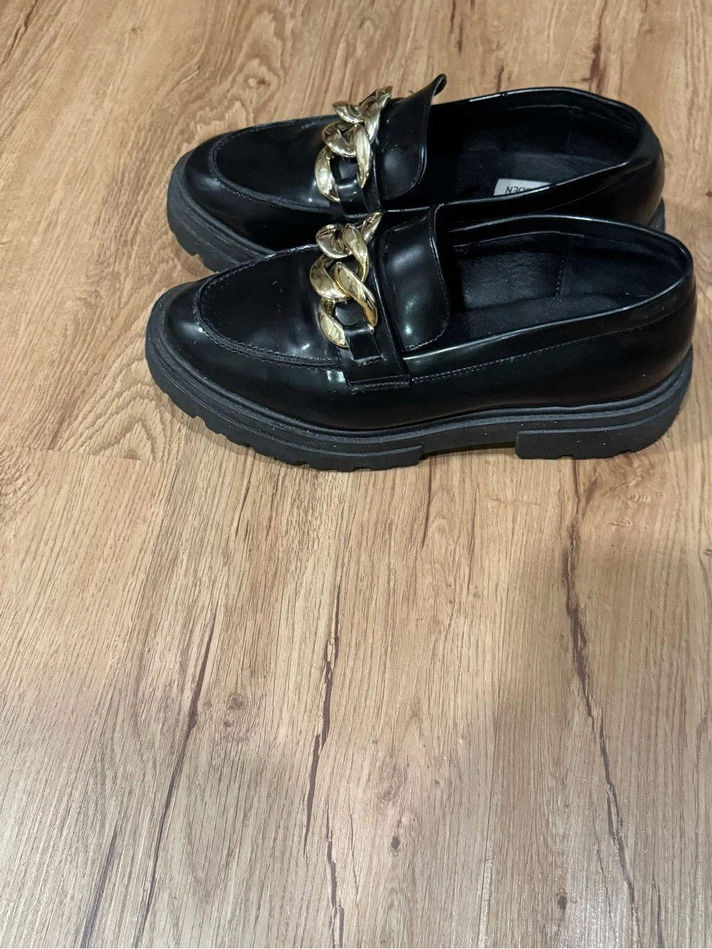 Steve Madden Black Leather Loafers with Gold Chain Accent